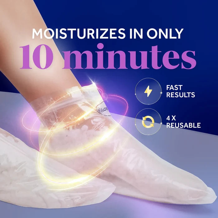 Clear warming paraffin foot mask booties on feet, showing snug fit around ankles