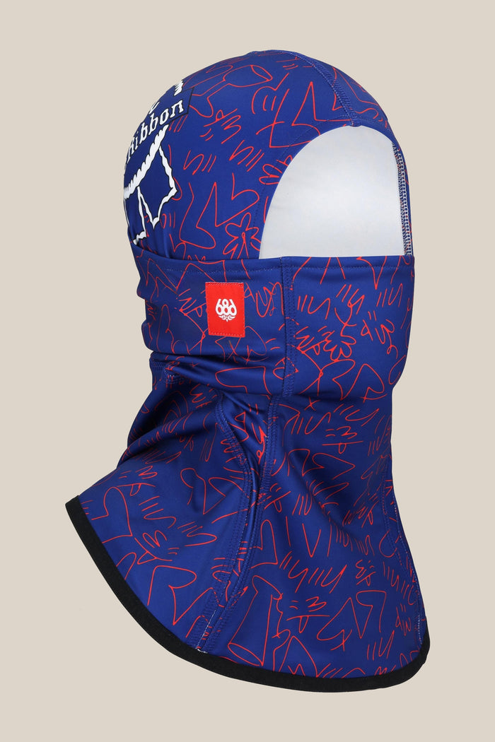 The 686 Alpha Hinged Balaclava by 686 features blue and purple tones, red abstract line patterns, and a white logo on the forehead. Shown on a beige background, it covers the head, neck, and lower face while leaving the eyes exposed.