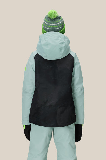 A person is shown from the back wearing a 686 Boys' Hydra™ Insulated Jacket by 686 in light blue with a black back panel, light blue pants, black gloves, and a green/gray striped beanie with a green pom-pom against a beige background.