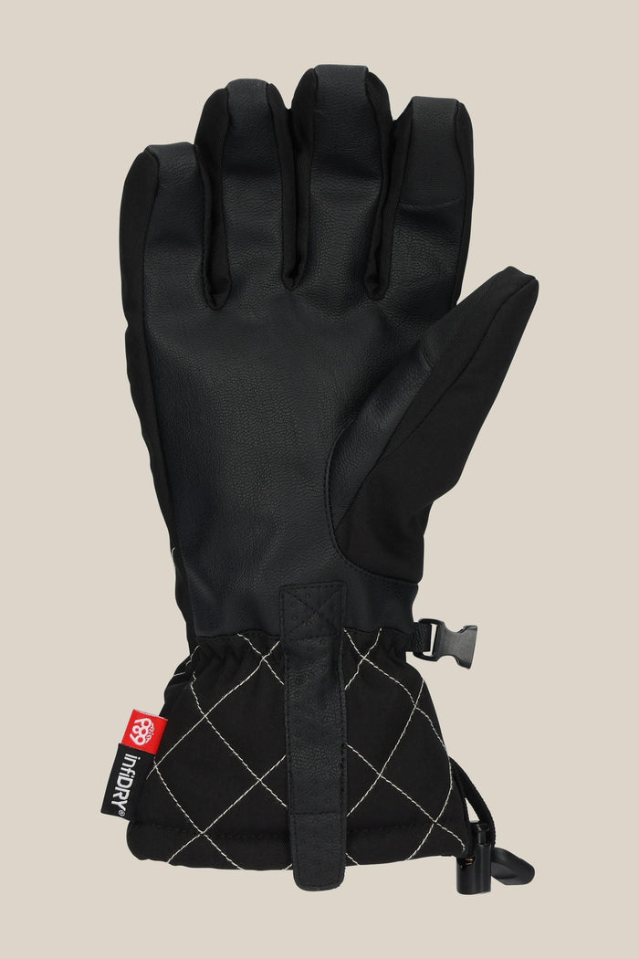 The 686 Women's Jubilee™ Glove by 686 is black with a diamond-stitched cuff, cinch cord at the wrist, and a red tag featuring a white logo on the side, shown against a neutral background.