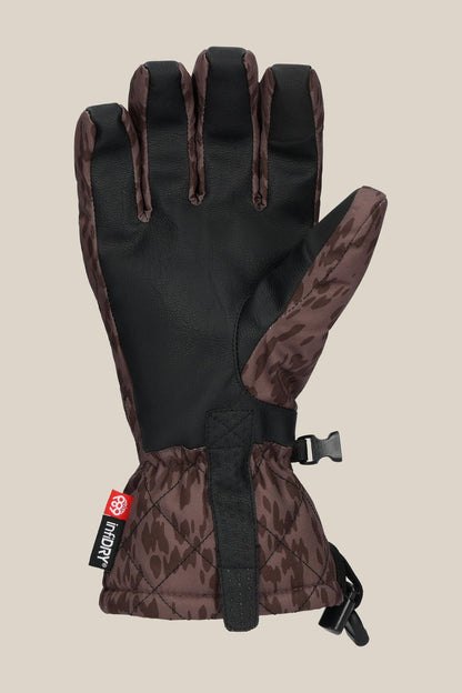 The 686 Women's Jubilee™ Glove by 686 features a brown and black patterned design, a black palm, adjustable wrist strap, and a side plastic buckle, displayed on a plain beige background.