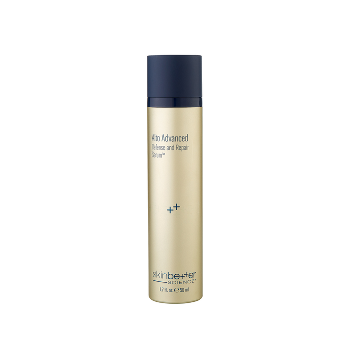 Skincare serum bottle with blue cap and beige body on a white background