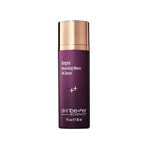 Skincare serum bottle with purple body and gold cap on a white background