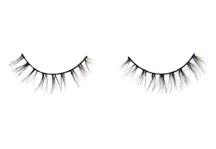 Ardell's Ecolashes 453 with multi-layered lash fibers, medium volume, medium length and a rounded shape