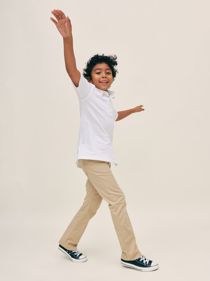DL1961 boys' Benji Straight pants in khaki twill 'Almond', on child model mid-stride.