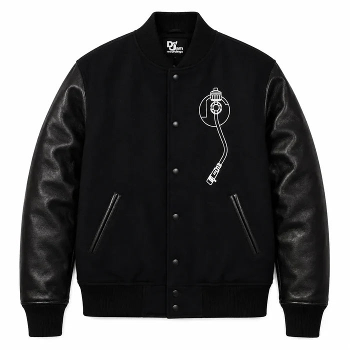 Front and back catalog layout of the Leveljacket Def Jam Recordings black varsity jacket, displaying a premium black wool body with black leather sleeves, custom white embroidered turntable needle art on the front chest, and a bold white Def Jam Recordings typography patch layout across the back.