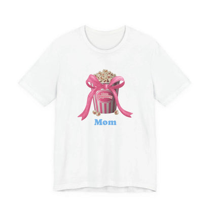 White t-shirt with pink popcorn bucket graphic, pink ribbon bow, and blue text Mom