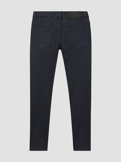 DL1961 boys' Brady Slim jeans in dark blue-black 'Dusk', flat back view.