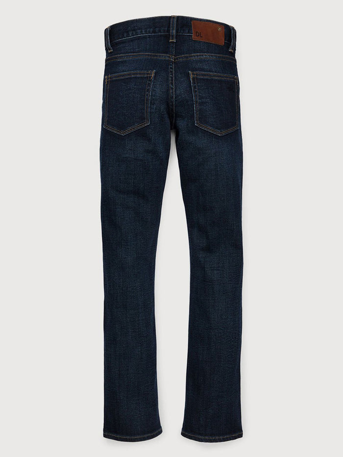 DL1961 boys' Brady Slim jeans in dark indigo blue 'Ferret', flat back view.