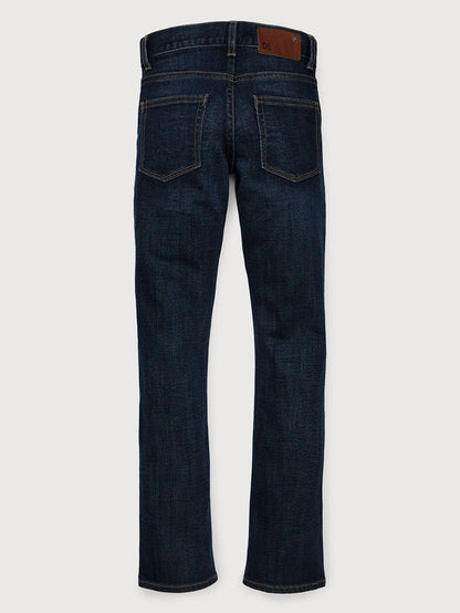DL1961 boys' Brady Slim jeans in dark indigo blue 'Ferret', flat back view.