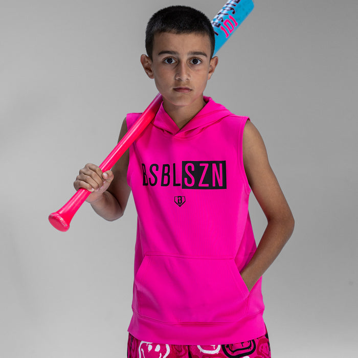 Child wearing a bright pink sleeveless hoodie with 'BSBLSZN' logo, holding a pink bat against a gray background.