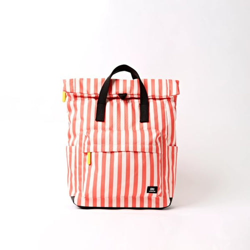 Medium canvas backpack with coral-white vertical stripes, top flap, black webbing handles