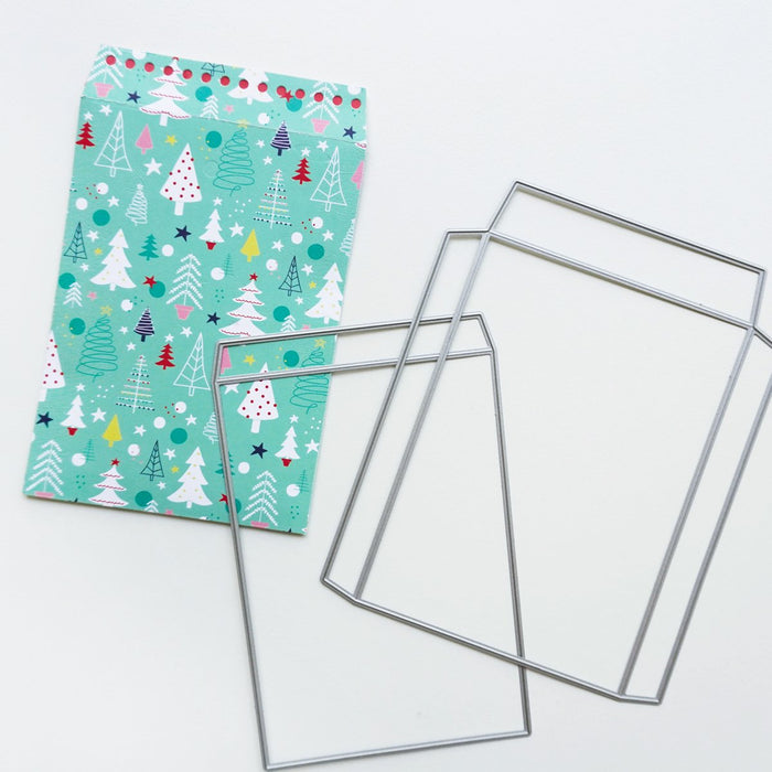 Catherine Pooler - Dies - Notecard Envelope. Create your own adorable notecard sized envelope with our Notecard Envelope Die. This pair of dies will work with our 6x6" paper to create two cut and scored pieces that you can easily adhere together to create custom envelopes. The envelope is measures at 3 3/4" x 5 1/2" and is a perfect fit for a 3.5" x 5" CP Notecard or 4 Bar sized card base. Available at Embellish Away located in Bowmanville Ontario Canada. Die cut example
