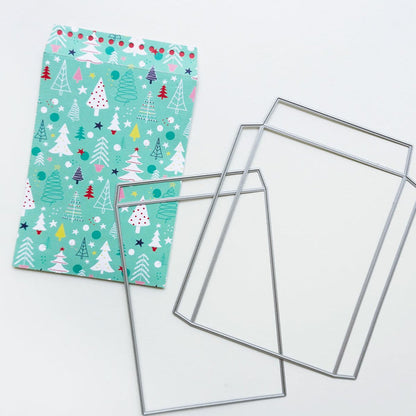 Catherine Pooler - Dies - Notecard Envelope. Create your own adorable notecard sized envelope with our Notecard Envelope Die. This pair of dies will work with our 6x6" paper to create two cut and scored pieces that you can easily adhere together to create custom envelopes. The envelope is measures at 3 3/4" x 5 1/2" and is a perfect fit for a 3.5" x 5" CP Notecard or 4 Bar sized card base. Available at Embellish Away located in Bowmanville Ontario Canada. Die cut example