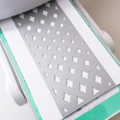Catherine Pooler - Slimline Cover Plate Die - Marquise. The Marquise Slimline Cover Plate die has a gradient diamond pattern that mirrors the shape of a marquise cut. This cover plate will add wonderful texture to a classy card just layered on white over white. You could also blend some colors behind it to create a sparkly bit of movement on your card.  The Marquise Slimline Die measures 3.5" x 8.5". Available at Embellish Away located in Bowmanville Ontario Canada.