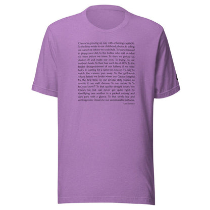 Lilac unisex t-shirt with Cheers to Growing Up Gay prose by Leo Herrera in black text, ghost mannequin front view, Adam's Nest Provincetown