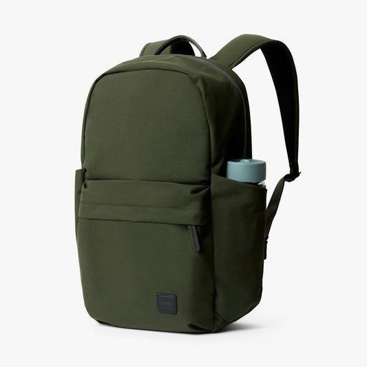 Olive classic daypack with front pocket and top handle, adjustable shoulder straps