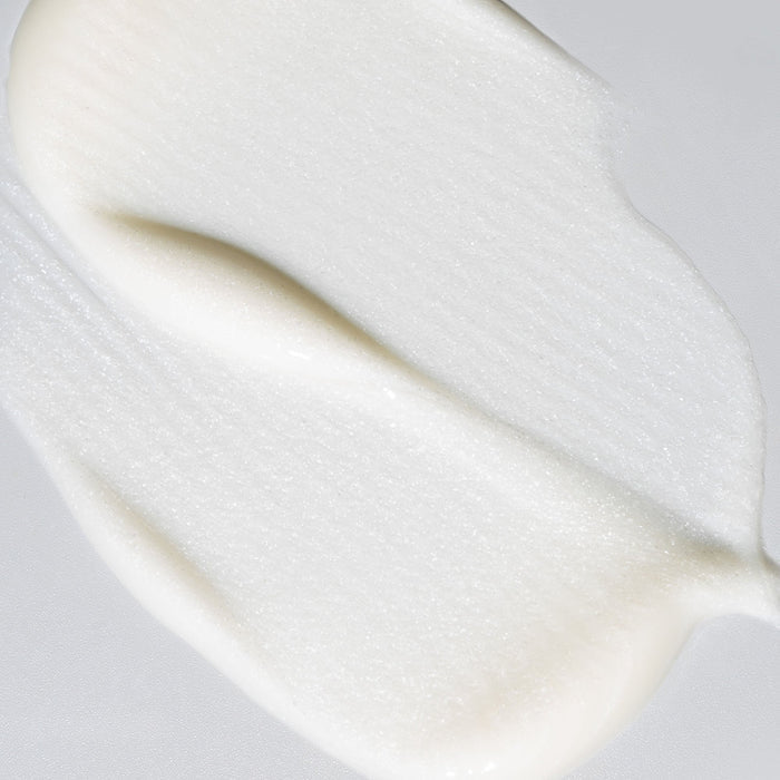 Crystal Cleanse cleansing cream texture close up showing smooth white cream
