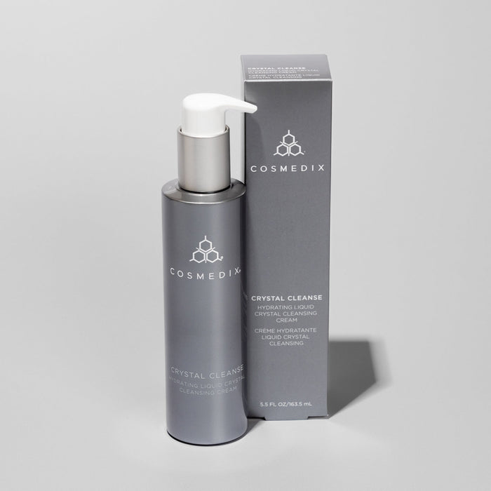 Cosmedix Liquid Crystal Hydration Duo bottle with pump beside a gray Crystal Cleanse box