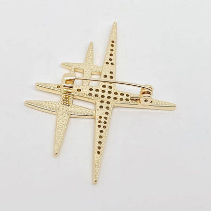 Mio Queena cubic zirconia star brooch pin with sparkling stones on a silver-tone metal backing