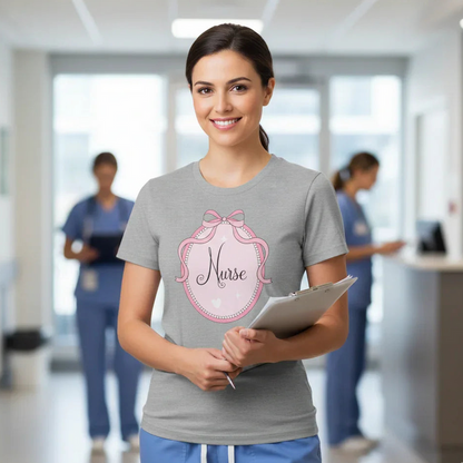 Woman in a hospital setting wearing a 'Nurse' t-shirt with a pink design.