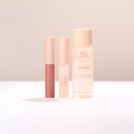 Daily Essentials Set by House of Lashes with remover and pink tubes on a pale background