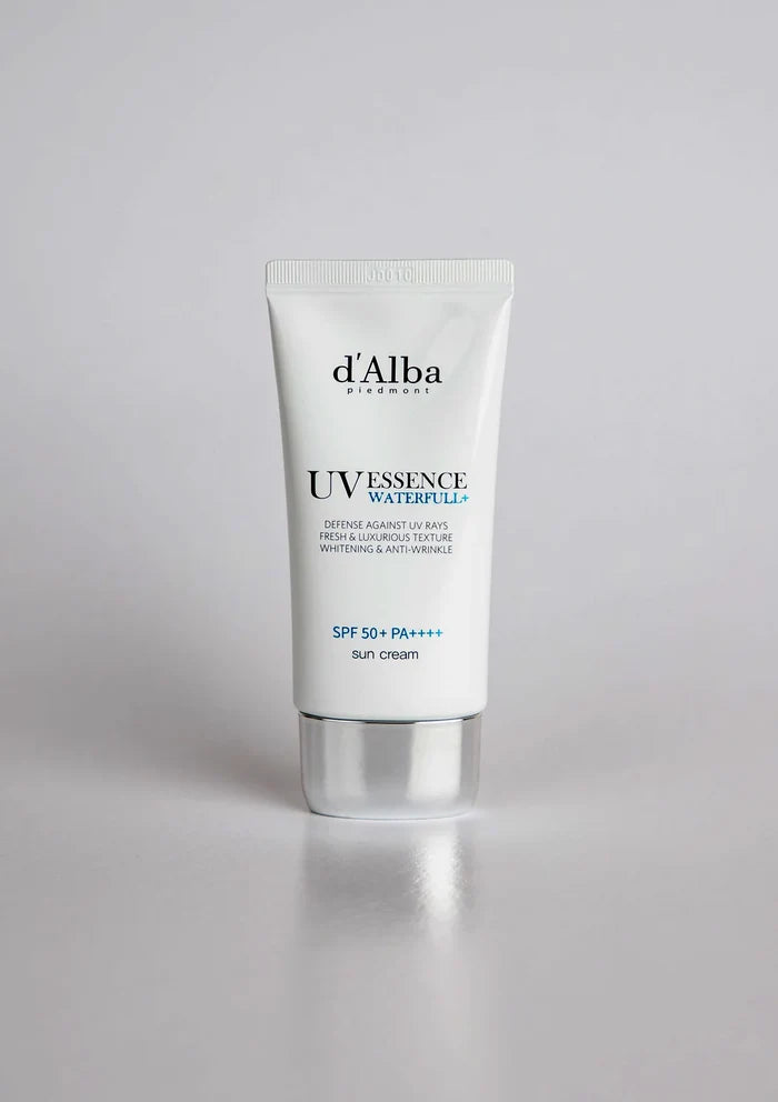 Tube of d'Alba UV Essence Waterfull cream on a white background