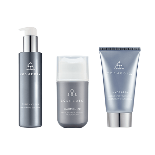 Essentials Bundle featuring Purity Clean Exfoliating Cleanser, Harmonize Microbiome Boosting Moisturizer, and Hydrate+ SPF sunscreen.