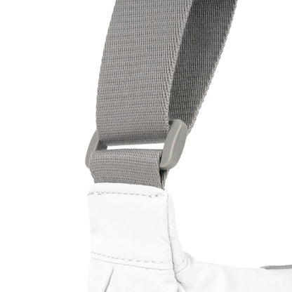 Coconut half-moon bag strap with gray webbing and stitched end attachment.