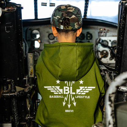 Youth model wearing green Flight Deck Army Green youth hoodie