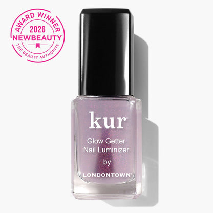 LONDONTOWN Glow Getter Nail Luminizer, a 2026 NewBeauty Award Winner, delivers skincare for nails and an ethereal finish, displayed on a white background.
