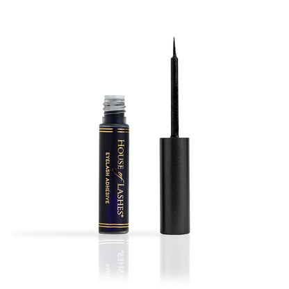 HOL® DARK Lash Glue bottle and applicator on a white background.
