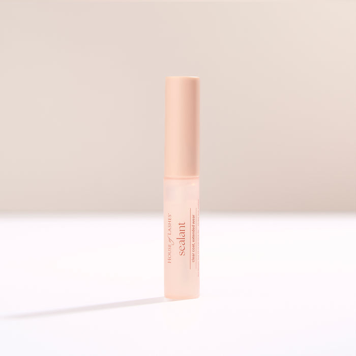 HOL Sealant close up of pink cap against a soft beige background