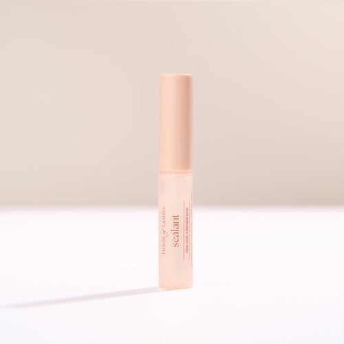 HOL Sealant close up of pink cap against a soft beige background