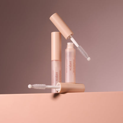 HOL Sealant bottle with angled applicator wand against a warm brown background