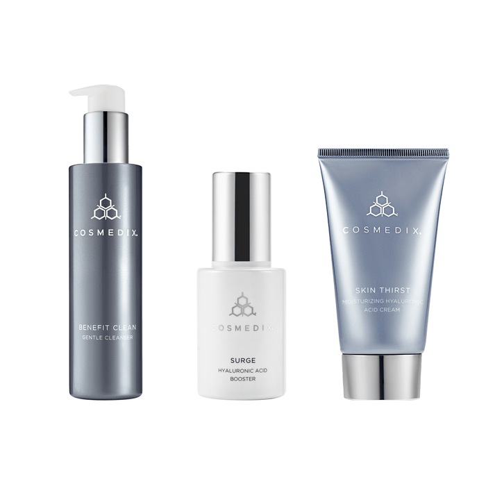 CosMedix Hydration Bundle with Benefit Clean Gentle Cleanser on left, Surge Hyaluronic Acid Booster in center, and Skin Thirst Moisturizing Cream on right