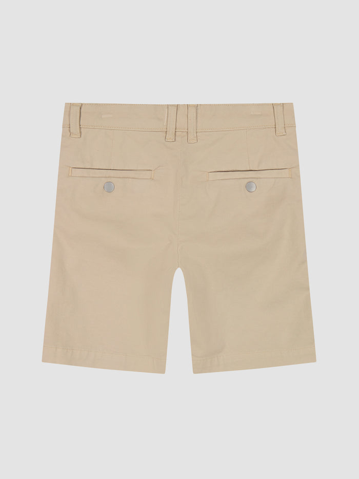 DL1961 boys' Jacob Chino Short in light beige twill 'Brut', flat back view.