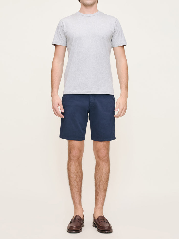 DL1961 men's Jake chino shorts in navy 'Classic Navy', front view on model with grey tee.