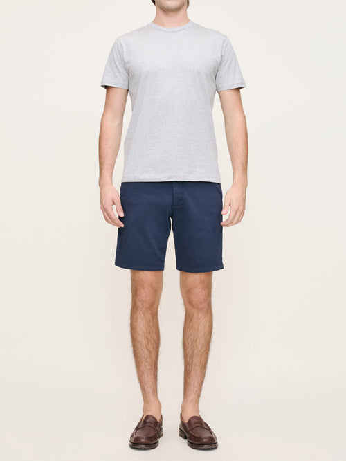 DL1961 men's Jake chino shorts in navy 'Classic Navy', front view on model with grey tee.