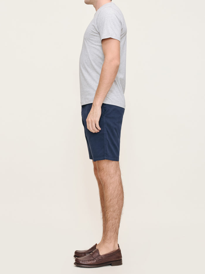DL1961 men's Jake chino shorts in navy 'Classic Navy', side view on model.