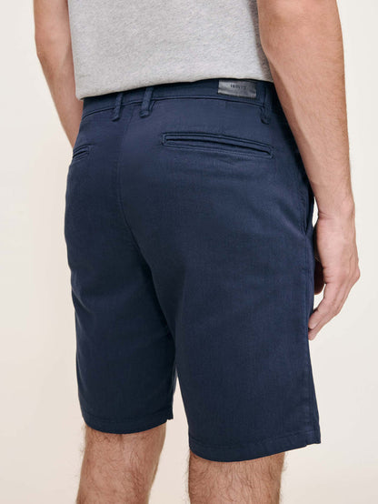DL1961 men's Jake chino shorts in navy 'Classic Navy', back pocket close-up.