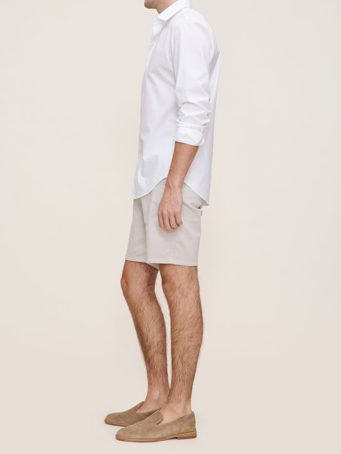 DL1961 men's Jake chino shorts in light grey 'Light Grey', side view on model.