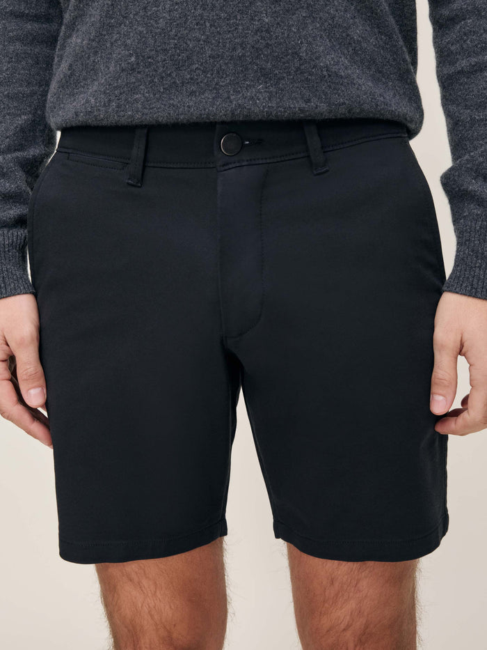 DL1961 men's Jake Dynamic short in black 'Black Onyx', front waistband close-up on model.