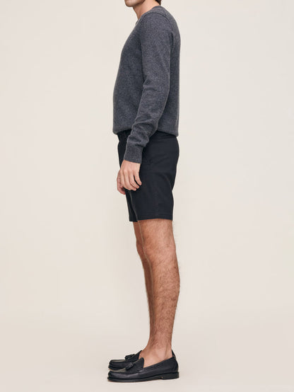 DL1961 men's Jake Dynamic short in black 'Black Onyx', side view on model with loafers.