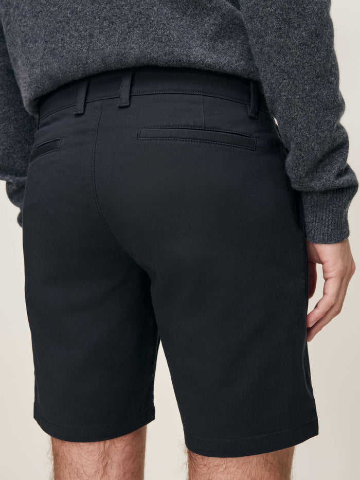 DL1961 men's Jake Dynamic short in black 'Black Onyx', back pocket close-up detail.