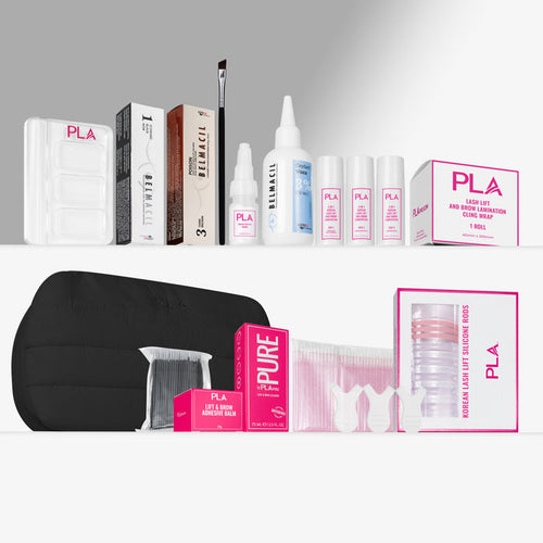 A lash lift kit arranged on a light gray background, including multiple boxed and bottle products labeled PLA, a black puff pouch bag, clear mixing tray, pink and white packaging, and lift and brow adhesive. No person, animal, or real environment is present, so this is Product/Packaging.