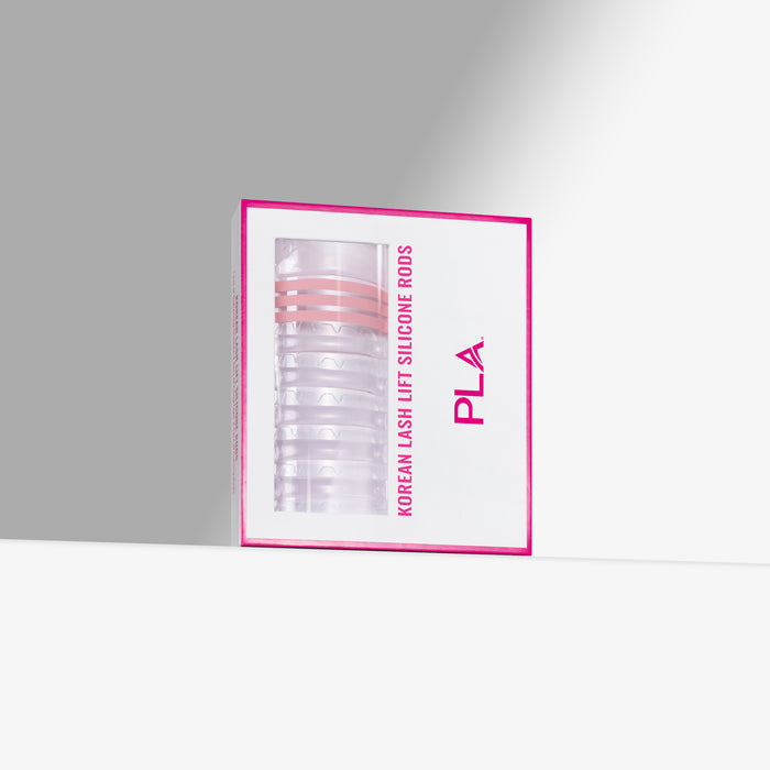 Packaging of Korean lash lift silicone rods with pink border on a gray background