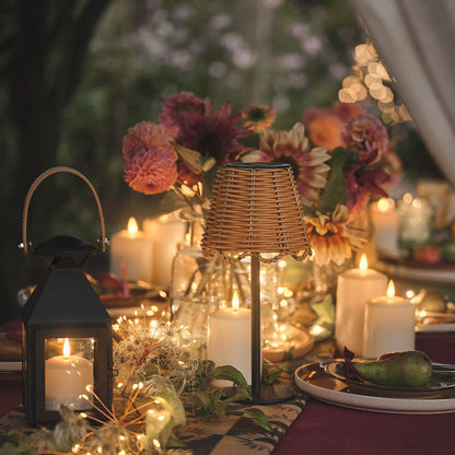 Summer outdoor dining table with lanterns and LED candles