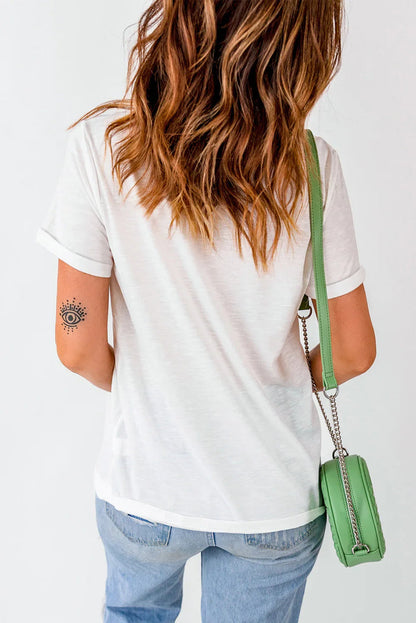 Person wearing a white t-shirt and blue jeans with a green handbag on a white background