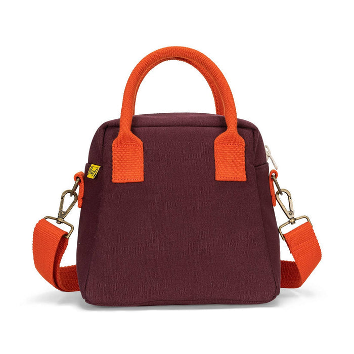 Lunch clutch bag in fig purple with orange handles and side strap